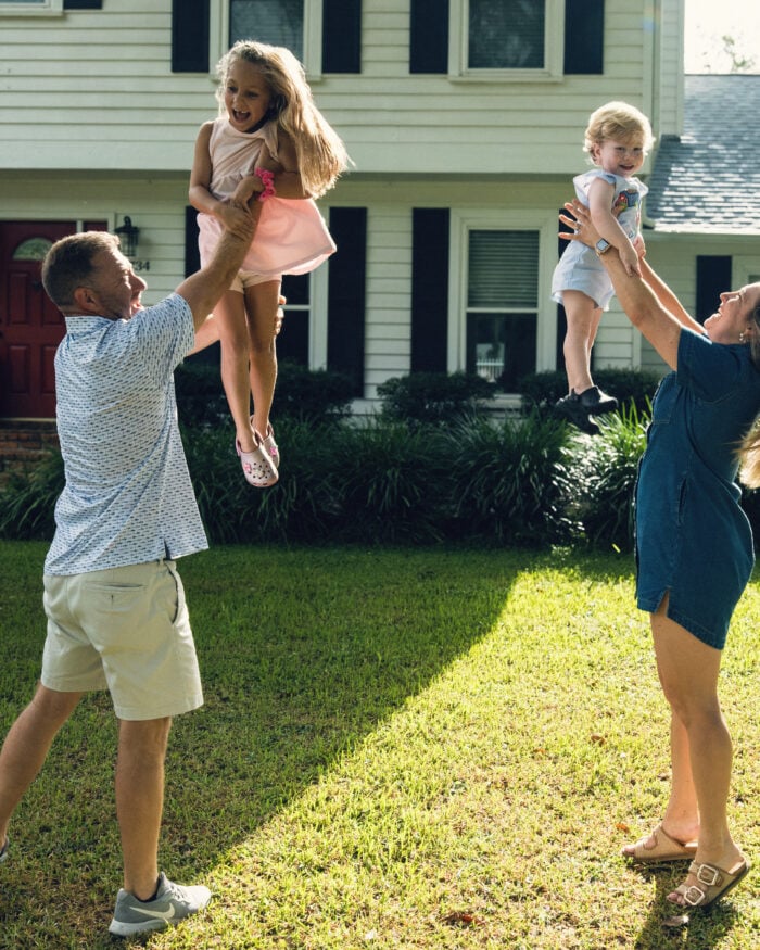 Tallahassee Family playing with their kids in the yard